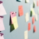 Sticky notes on the wall.