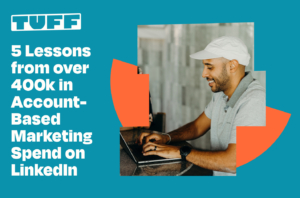 Man smiling while working on laptop with blog title '5 Lessons from over 400k in Account-Based Marketing Spend on LinkedIn' overlay.